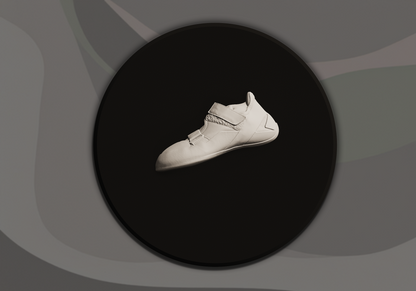 White climbing shoe on a black circular platform with a grey background
