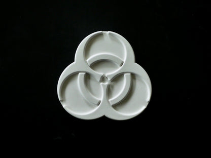 Biohazard symbol on a black background